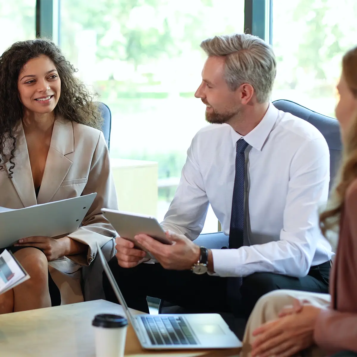 Professionals collaborating in a modern office